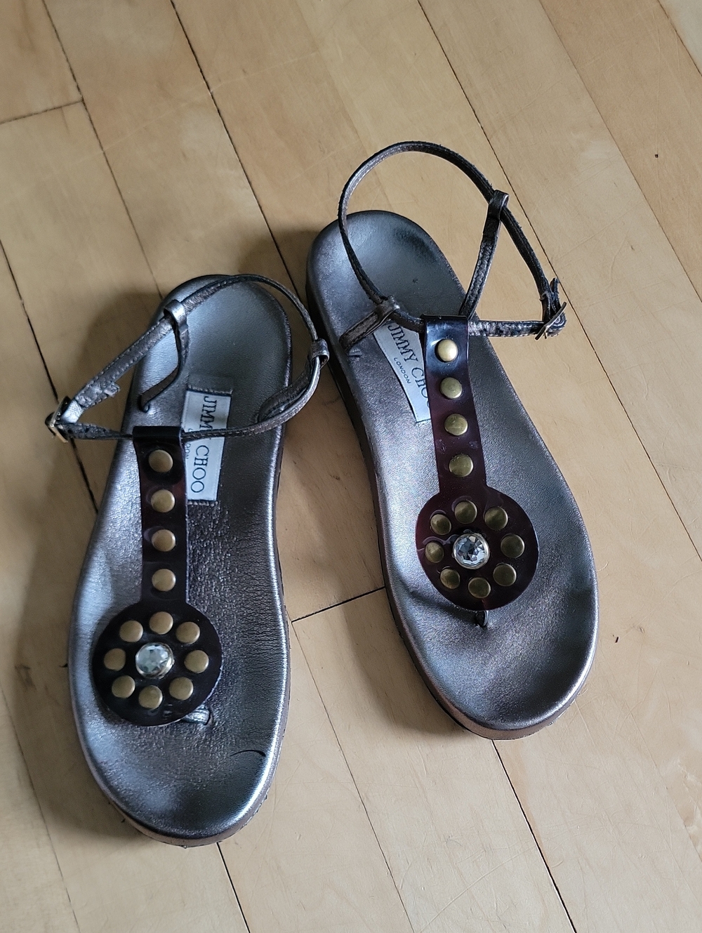 Jimmy Choo Metallic Bronze T-Strap Sandals with Gold Studs and Crystal - 5.5